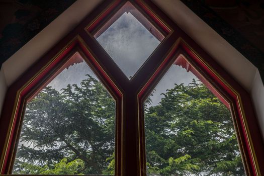 The window that receives light is inside the Thai temple church, Sunlight through the church window