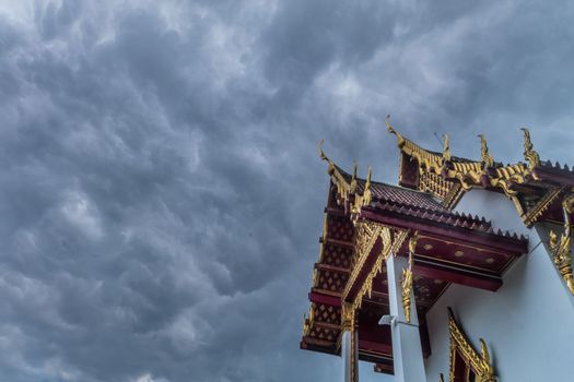 The roof of the Thai temple, along with the gable at the top of the church with a sky backdrop Suitable for making background images.