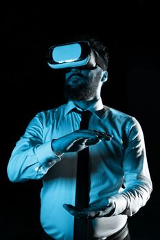Man Wearing Vr Glasses And Presenting Important Messages Between Hands.