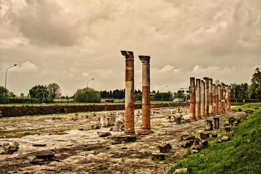 View of columns, Roman ruins on Archeological area of Aquileia in Italy