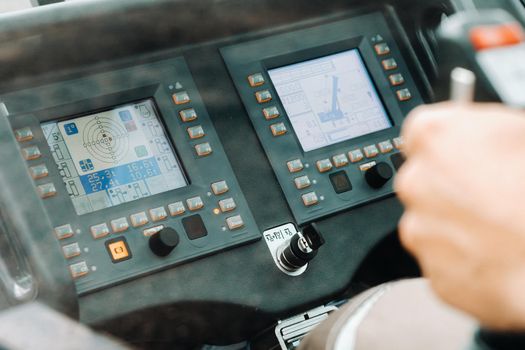 Crane control panel in the driver's cab of a car crane.