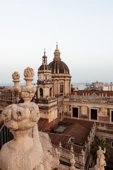 Top view of St. Agata church of Catania from the Badia church at sunset
