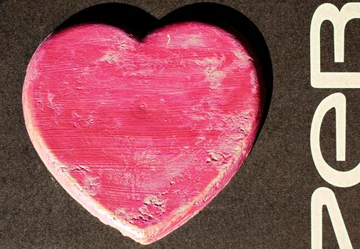 Digital artwork of a red heart on dark background