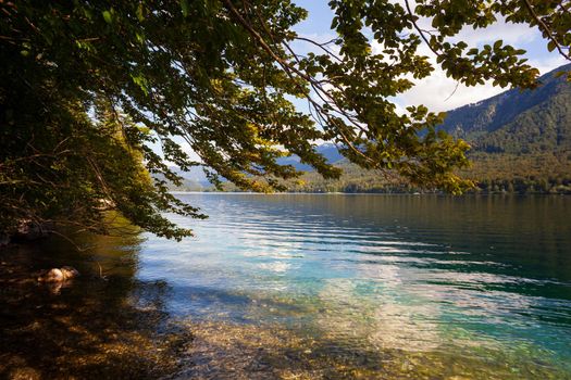 View of scenic Bohinj lake, the largest permanent lake in Slovenia, located within the Bohinj Valley of the Julian Alps