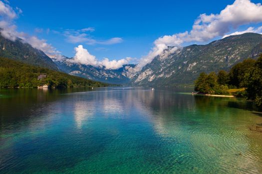 View of scenic Bohinj lake, the largest permanent lake in Slovenia, located within the Bohinj Valley of the Julian Alps