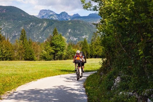 Mountain Bike cyclists riding countryside track in Bohinj, Slovenia