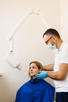 Teeth x ray scanning for detect toothache and treat roots. Dentist do x-ray tooth scan for woman in dentistry