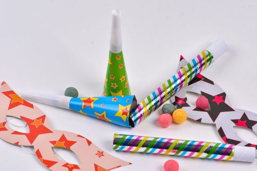 Colorful party items for birthday on a white background