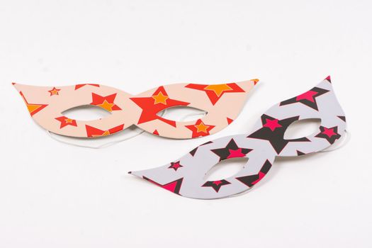 Paper masks for a party on a white background