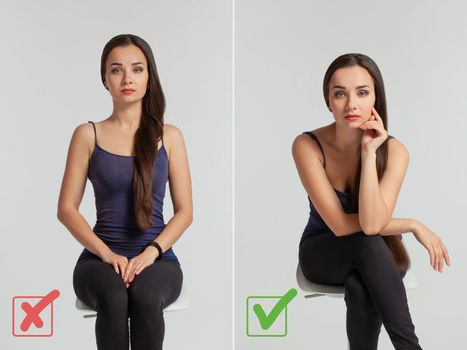 Portrait of a young beautiful girl with a loose brunette hair looking at the camera while sitting against a gray background. She is demonstrating the right and wrong way of posing for a photo.