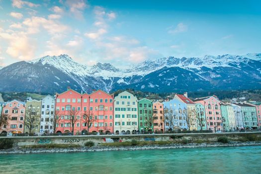 Innsbruck, cityscape and Idyllic North Tyrol snowcapped Karwendel mountain range at sunrise, Austria