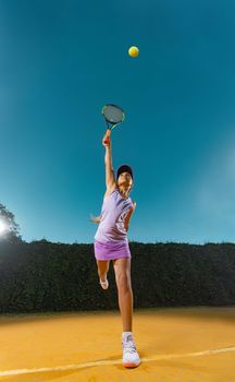 Tennis player. Girl teenager athlete with racket on tennis court. Download photo for advertising in tennis and sports for social networks.