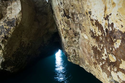 Rosh Hanikra grottoes rocks and caves famous nature tourist site (attraction) in north-western Israel (Galilee region), near Nahariya, in Mediterranean Sea. geological creation in coastline (shore)