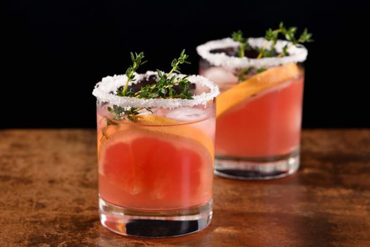 Pink Paloma with red grapefruit and tequila. The red grapefruit adds the perfect amount of sweetness, and the vibrant color of the juice makes this a great cocktail. Organic vegetarian drink.
