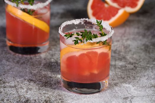 Pink Paloma with red grapefruit and tequila. The red grapefruit adds the perfect amount of sweetness, and the vibrant color of the juice makes this a great cocktail. Organic vegetarian drink.