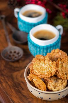 Christmas homemade chocolate chip cookies, cup of coffee on a wooden background.