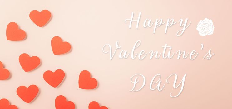 Happy Valentine's day concept. Red paper hearts cutting pastel pink background, Symbol of love paper art with copy space for text, Mother's Day