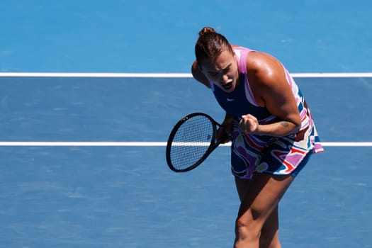 MELBOURNE, AUSTRALIA - JANUARY 23: Aryna Sabalenka of Belarus ce;ebrates beating Belinda Bencic of Switzerland on day 8 of the 2023 Australian Open at Melbourne Park on January 23, 2023 in Melbourne, Australia.