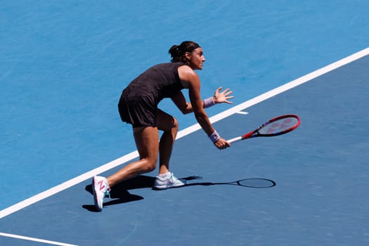 MELBOURNE, AUSTRALIA - JANUARY 23: Caroline Garcia of France plays against Magda Linette of Poland on day 8 action of the 2023 Australian Open at Melbourne Park on January 23, 2023 in Melbourne, Australia.