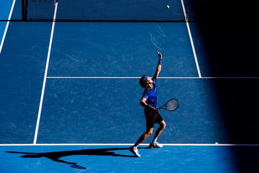 MELBOURNE, AUSTRALIA - JANUARY 23: Andrey Rublev of Russia plays Holger Rune of Denmark in the 4th round on day 8 of the 2023 Australian Open at Melbourne Park on January 23, 2023 in Melbourne, Australia.