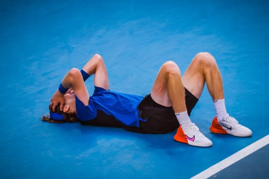 MELBOURNE, AUSTRALIA - JANUARY 23: Andrey Rublev of Russia plays Holger Rune of Denmark in the 4th round on day 8 of the 2023 Australian Open at Melbourne Park on January 23, 2023 in Melbourne, Australia.