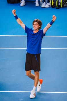 MELBOURNE, AUSTRALIA - JANUARY 23: Andrey Rublev of Russia plays Holger Rune of Denmark in the 4th round on day 8 of the 2023 Australian Open at Melbourne Park on January 23, 2023 in Melbourne, Australia.