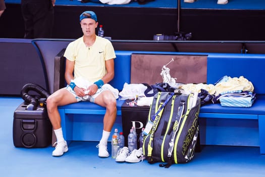MELBOURNE, AUSTRALIA - JANUARY 23: Holger Rune of Denmark is dejected after losing to Andrey Rublev of Russia in the 4th round on day 8 of the 2023 Australian Open at Melbourne Park on January 23, 2023 in Melbourne, Australia.