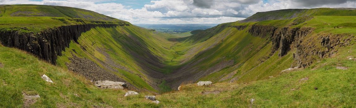 Panorama from the edge of High Cup Nick down the High Cup Gill chasm, Eden Valley, North Pennines, Cumbria, UK