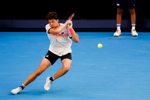 MELBOURNE, AUSTRALIA - JANUARY 23: Ben Shelton of USA plays J.J. Wolf of USA in the 4th round on day 8 of the 2023 Australian Open at Melbourne Park on January 23, 2023 in Melbourne, Australia.