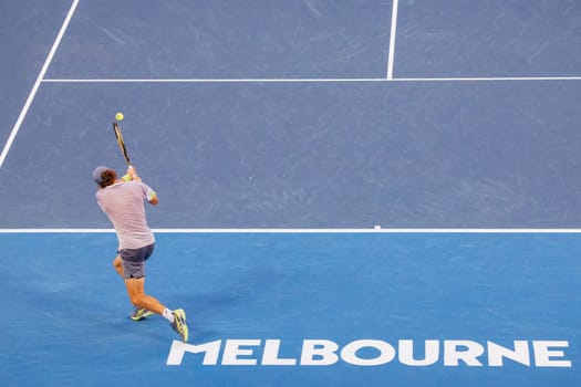 MELBOURNE, AUSTRALIA - JANUARY 23: Alex de Minaur of Australia plays Novak Djokovic of Serbia in the 4th round on day 8 of the 2023 Australian Open at Melbourne Park on January 23, 2023 in Melbourne, Australia.