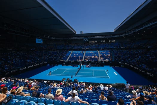 MELBOURNE, AUSTRALIA - JANUARY 23: Magda Linette of Poland plays Caroline Garcia of France on day 8 action of the 2023 Australian Open at Melbourne Park on January 23, 2023 in Melbourne, Australia.