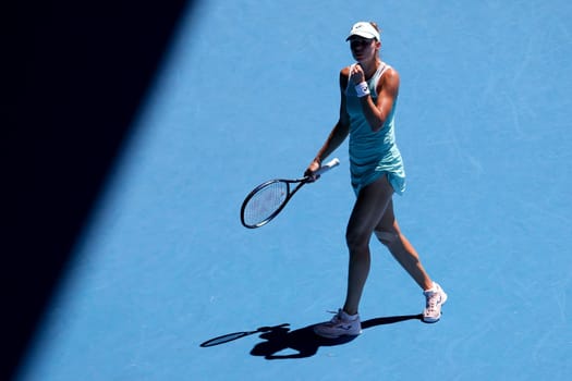 MELBOURNE, AUSTRALIA - JANUARY 23: Magda Linette of Poland plays Caroline Garcia of France on day 8 action of the 2023 Australian Open at Melbourne Park on January 23, 2023 in Melbourne, Australia.