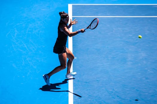 MELBOURNE, AUSTRALIA - JANUARY 23: Magda Linette of Poland plays Caroline Garcia of France on day 8 action of the 2023 Australian Open at Melbourne Park on January 23, 2023 in Melbourne, Australia.