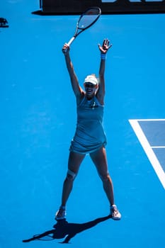 MELBOURNE, AUSTRALIA - JANUARY 23: Magda Linette of Poland celebrates beating Caroline Garcia of France on day 8 action of the 2023 Australian Open at Melbourne Park on January 23, 2023 in Melbourne, Australia.