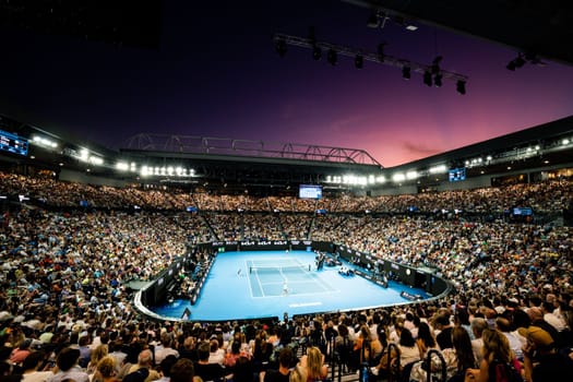MELBOURNE, AUSTRALIA - JANUARY 23: Alex de Minaur of Australia plays Novak Djokovic of Serbia in the 4th round on day 8 of the 2023 Australian Open at Melbourne Park on January 23, 2023 in Melbourne, Australia.
