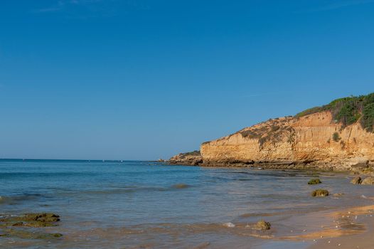Maria Luisa beach with rock formation in Albufeira, Algarve, Portugal.