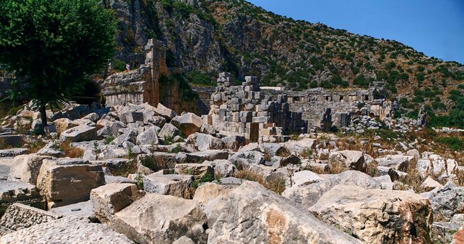 Stone Theater masks in Myra Ancient City. Demre, Antalya, Turkey