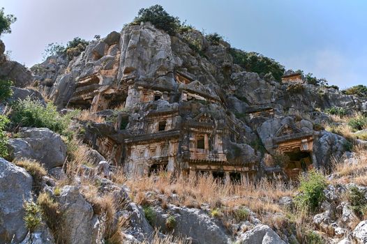 Koycegiz, Mugla, Turkey - July 12 2017: The rock tombs of the kings in the ancient city of Kaunos in Koycegiz Dalyan