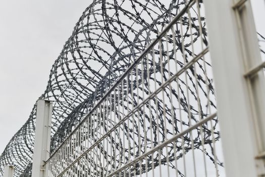 Fence with barbed wire at customs at europe