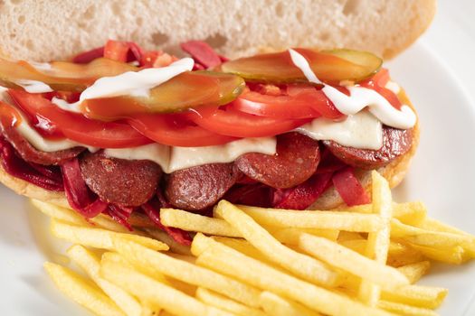 Kumru is a Turkish sandwich on a bun, typically with cheese, tomato, and sausage. The name of this street food translates as collared dove, and derives from the shape of the sandwich. Street Food. High quality photo
