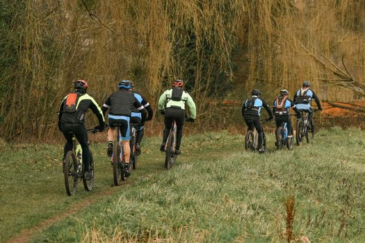Group of cyclists travel by bike