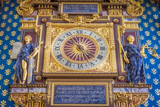 La Conciergerie Horloge, ornate Clock Tower of Palais de Justice close-up, Paris, France