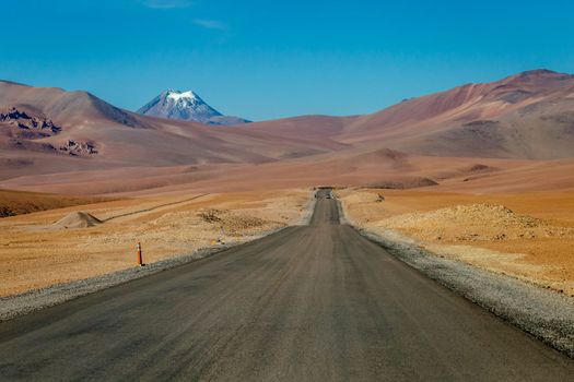 Road in Peaceful Moon Valley dramatic landscape at Sunset, Atacama Desert, Chile