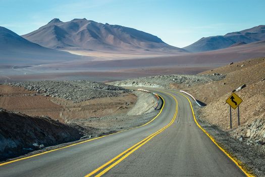 Road in Peaceful Moon Valley dramatic landscape at Sunset, Atacama Desert, Chile