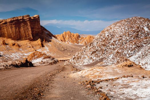 Dirt Road in Peaceful Moon Valley dramatic landscape at Sunset, Atacama Desert, Chile