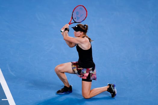MELBOURNE, AUSTRALIA - JANUARY 24: Elena Rybakina of Russia plays Jelena Ostapenko of Latvia in quarter finals action on day 9 of the 2023 Australian Open at Melbourne Park on January 24, 2023 in Melbourne, Australia.