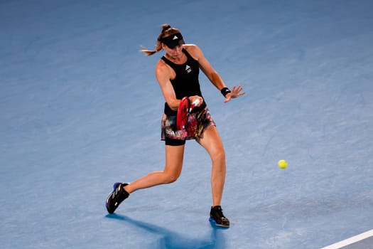 MELBOURNE, AUSTRALIA - JANUARY 24: Elena Rybakina of Russia plays Jelena Ostapenko of Latvia in quarter finals action on day 9 of the 2023 Australian Open at Melbourne Park on January 24, 2023 in Melbourne, Australia.