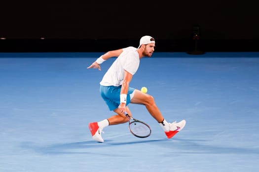 MELBOURNE, AUSTRALIA - JANUARY 24: Karen Khachanov of Russia in quarter final action against Sebastian Korda of USA on day 9 of the 2023 Australian Open at Melbourne Park on January 24, 2023 in Melbourne, Australia.