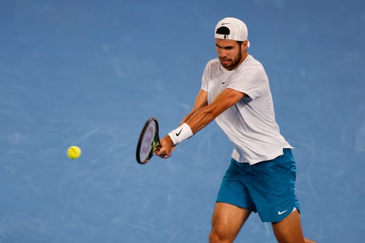MELBOURNE, AUSTRALIA - JANUARY 24: Karen Khachanov of Russia in quarter final action against Sebastian Korda of USA on day 9 of the 2023 Australian Open at Melbourne Park on January 24, 2023 in Melbourne, Australia.