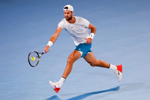 MELBOURNE, AUSTRALIA - JANUARY 24: Karen Khachanov of Russia in quarter final action against Sebastian Korda of USA on day 9 of the 2023 Australian Open at Melbourne Park on January 24, 2023 in Melbourne, Australia.